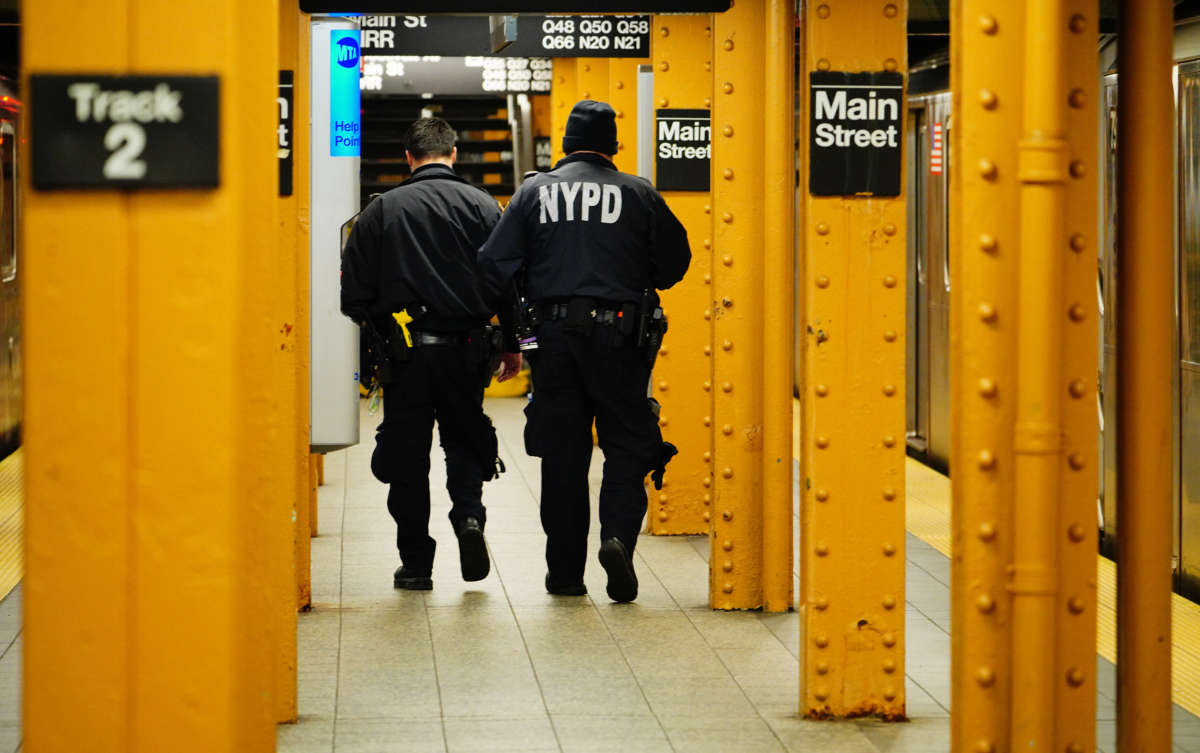 NYPD police officers patrol the subway at Flushing Queens amid the COVID-19 pandemic on April 5, 2020.