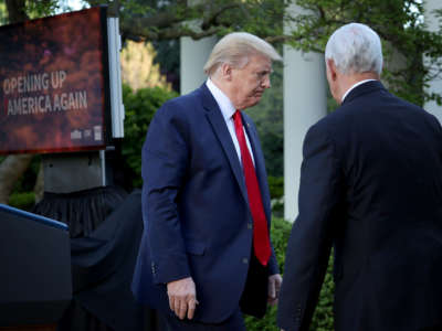 President Donald Trump departs the Rose Garden with Vice President Mike Pence following the daily briefing of the coronavirus task force at the White House on April 27, 2020, in Washington, D.C.