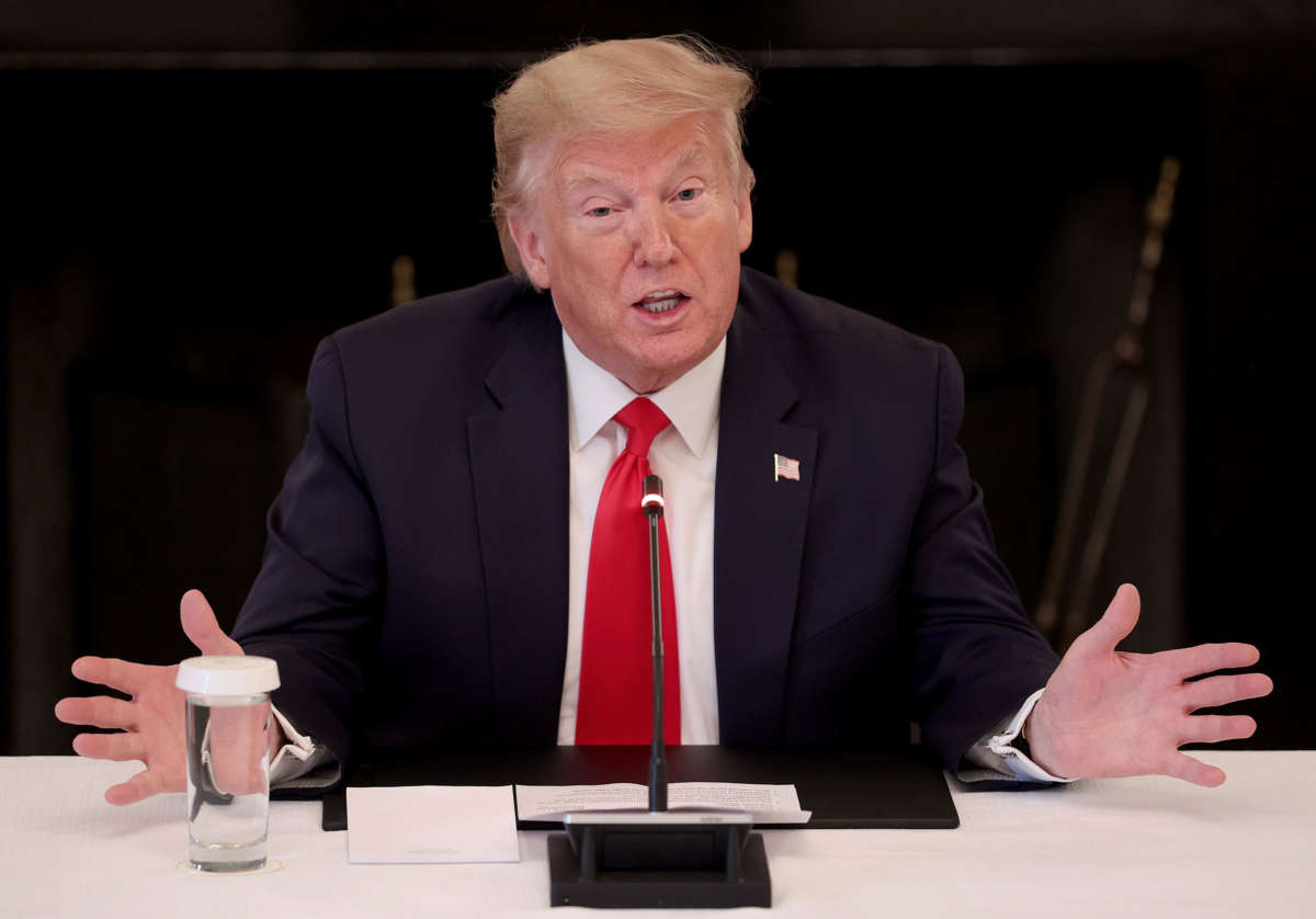 President Trump speaks while meeting with industry executives during an event on "Opening Up America Again" at the White House on April 29, 2020, in Washington, D.C. Trump said, "This virus is going to be gone," during his remarks at the event.