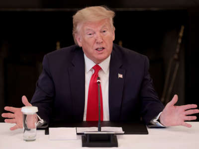 President Trump speaks while meeting with industry executives during an event on "Opening Up America Again" at the White House on April 29, 2020, in Washington, D.C. Trump said, "This virus is going to be gone," during his remarks at the event.