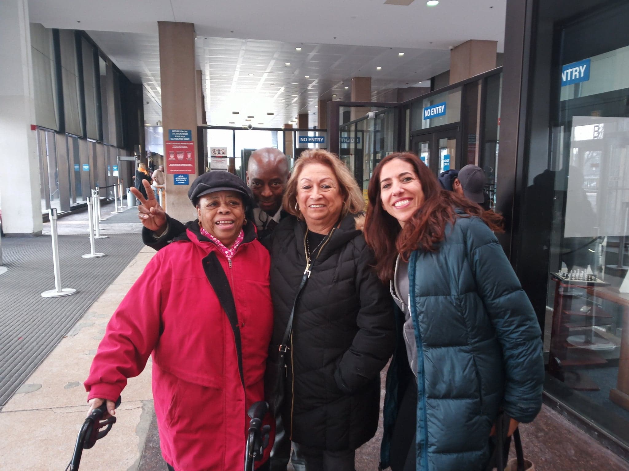 Armanda Shackelford (left) joins her son Herbert Reed and Bertha Escamilla (mother of torture survivor Nick Escamilla) and Nadine Naber (with the organization MAMAS) in the Cook County Criminal building Court on December 20, 2020, for yet another delay in her son Gerald Reed's case.