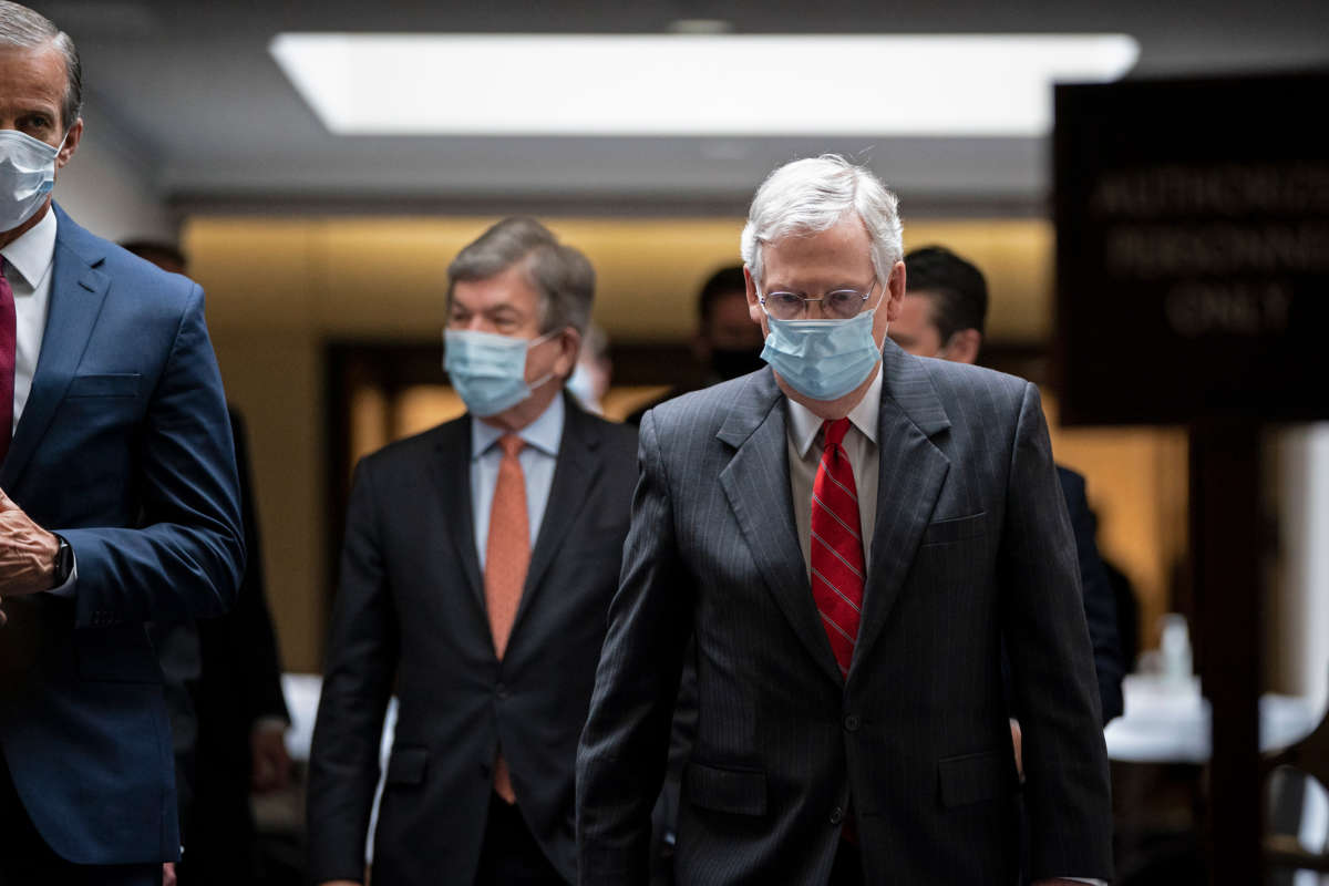 Senate Majority Leader Mitch McConnell leaves a Senate Republican policy luncheon in the Hart Senate Office Building, May 5, 2020, in Washington, D.C.