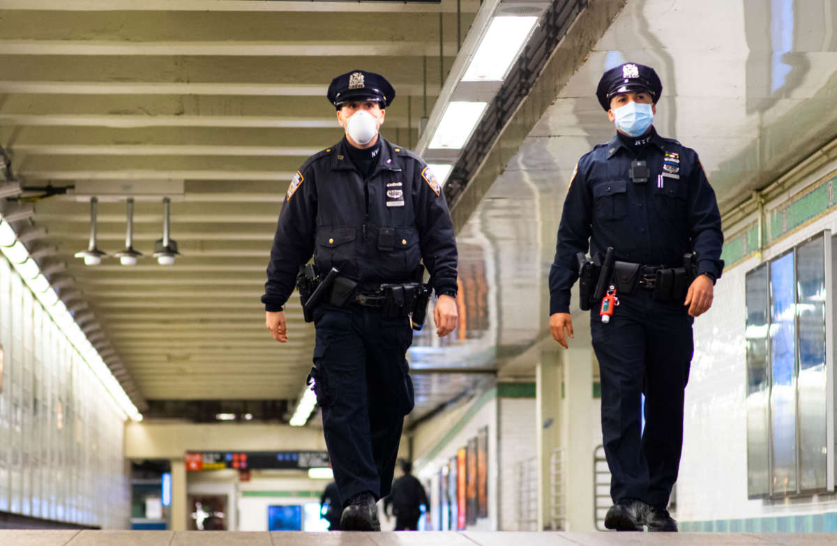 NYPD officers patrol inside Times Square station on May 6, 2020, in New York City.