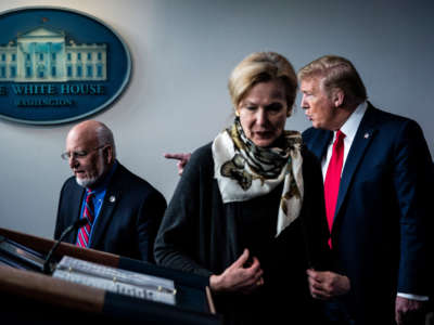 President Trump speaks with Dr. Deborah Birx, White House coronavirus response coordinator, Dr. Robert Redfield, director of the Centers for Disease Control and Prevention, and members of the coronavirus task force during a briefing in the James S. Brady Press Briefing Room at the White House on April 22, 2020, in Washington, D.C.