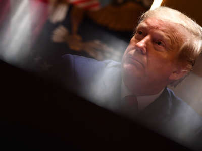 President Trump looks on during a meeting on May 13, 2020, in the Cabinet Room of the White House in Washington, D.C.