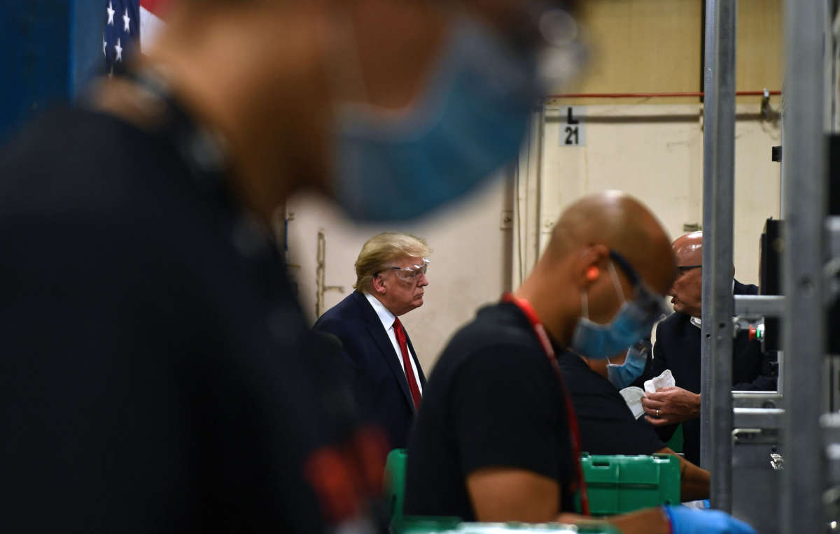 President Trump participates in a tour of a Honeywell International plant that manufactures personal protective equipment in Phoenix, Arizona, on May 5, 2020.