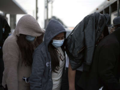 The first of three flights coming from Houston, Texas, arrives carrying migrants deported from the U.S. during the coronavirus pandemic in Guatemala City, Guatemala, on May 4, 2020.