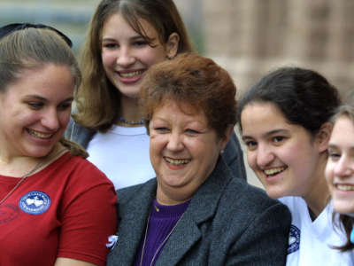 Norm McCorvey, the "Jane Roe" of Roe v. Wade, is surrounded by young people, January 27, 2001, during an anti-abortion rally in Austin, Texas.