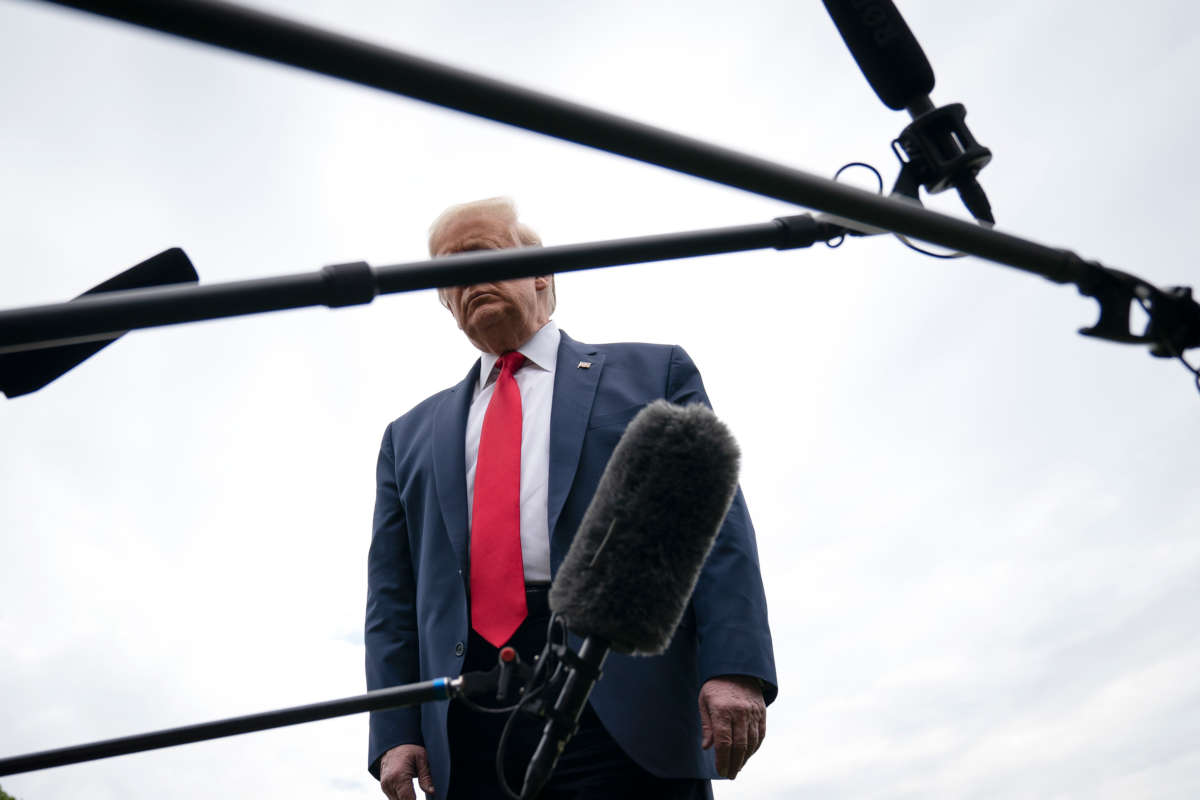 President Trump speaks to reporters on his way to Marine One on the South Lawn of the White House on May 14, 2020, in Washington, D.C.