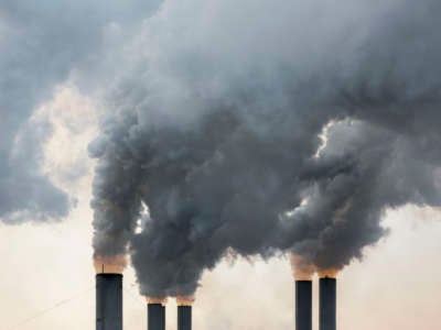Smokestacks spew pollution into the air