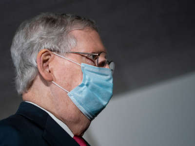 Mitch McConnell wears a face mask