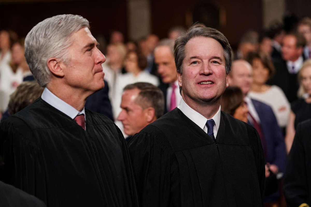 Supreme Court Justices Neil Gorsuch and Brett Kavanaugh attend the State of the Union address in the chamber of the U.S. House of Representatives at the U.S. Capitol Building on February 5, 2019, in Washington, D.C.