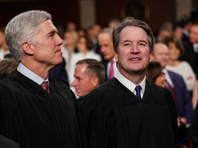 Supreme Court Justices Neil Gorsuch and Brett Kavanaugh attend the State of the Union address in the chamber of the U.S. House of Representatives at the U.S. Capitol Building on February 5, 2019, in Washington, D.C.