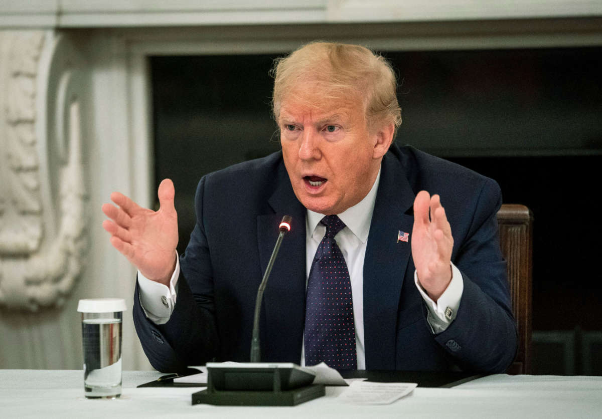 President Trump speaks during a roundtable in the State Dining Room of the White House in Washington, D.C.