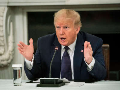 President Trump speaks during a roundtable in the State Dining Room of the White House in Washington, D.C.