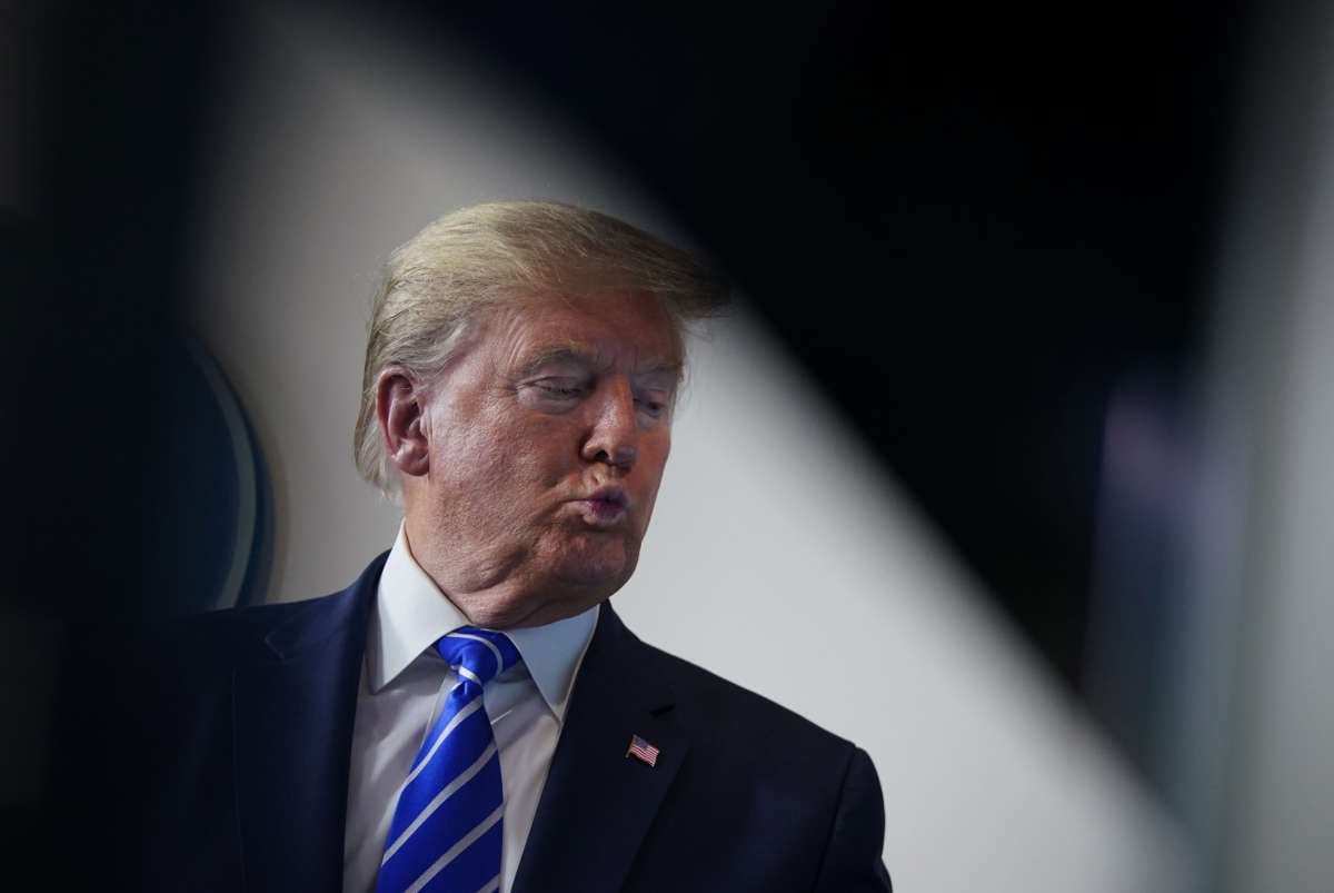 President Trump listens to a speaker during a briefing on COVID-19 in the Brady Briefing Room of the White House on April 23, 2020, in Washington, D.C.