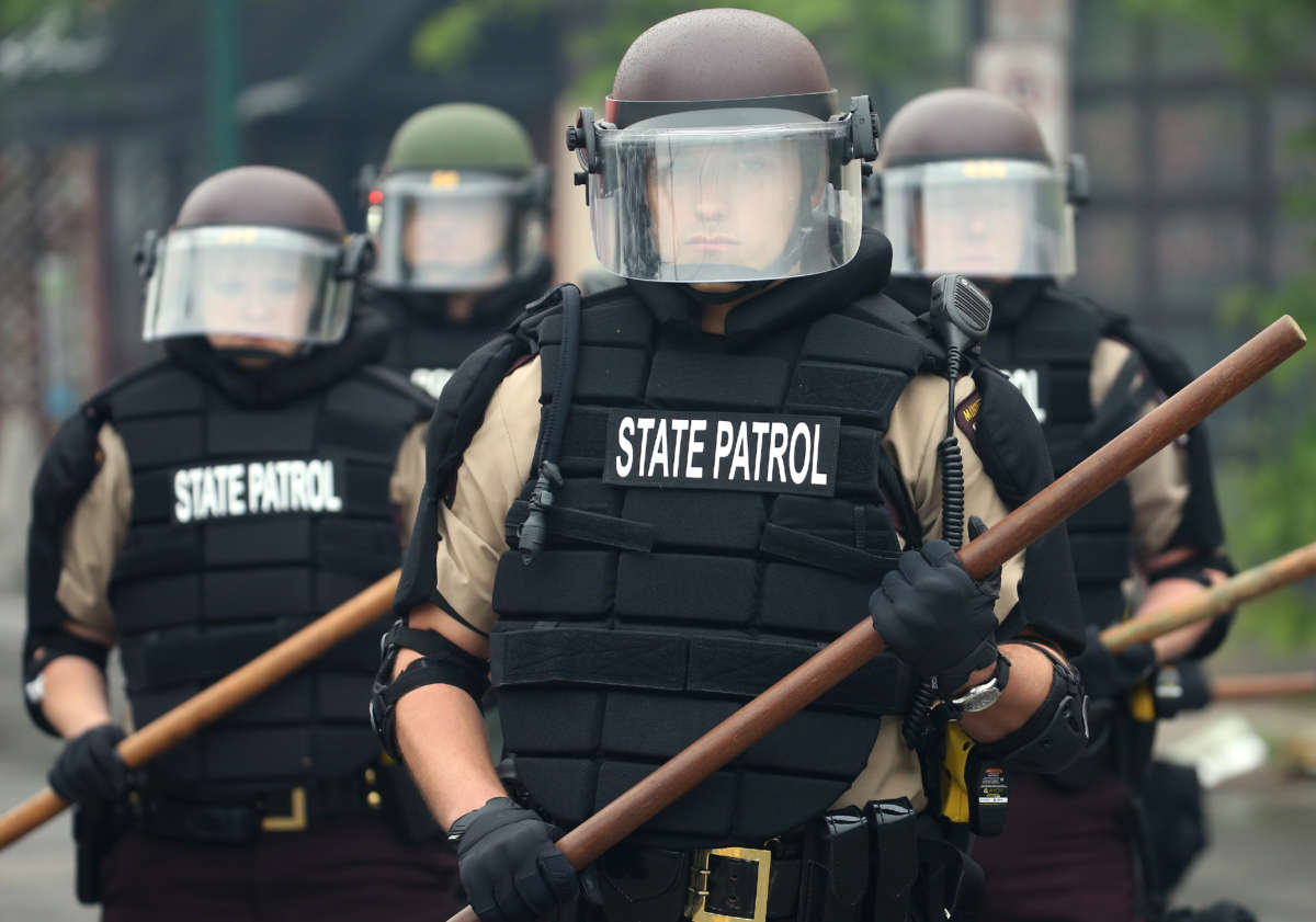 Police hold a line on the fourth day of protests on May 29, 2020, in Minneapolis, Minnesota.