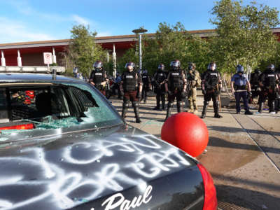 Police stand guard outside of a Target store on May 28, 2020, in St. Paul, Minnesota.