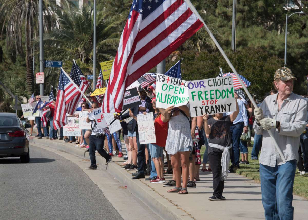 Trump supporters hold a rally to call for the reopening of the California economy after the lockdown closure, implemented to stop the spread of the novel coronavirus, in Woodland Hills, California, on May 16, 2020.