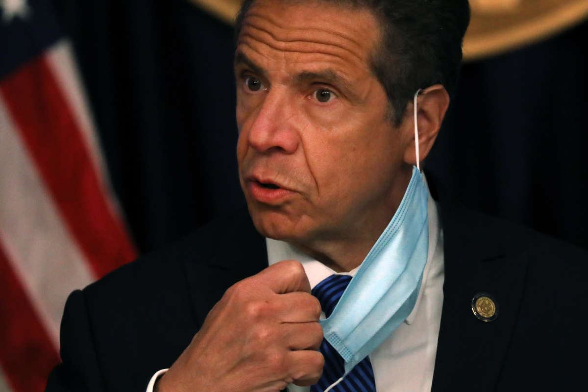 New York Gov. Andrew Cuomo arrives with a face mask at a news conference on May 21, 2020, in New York City.