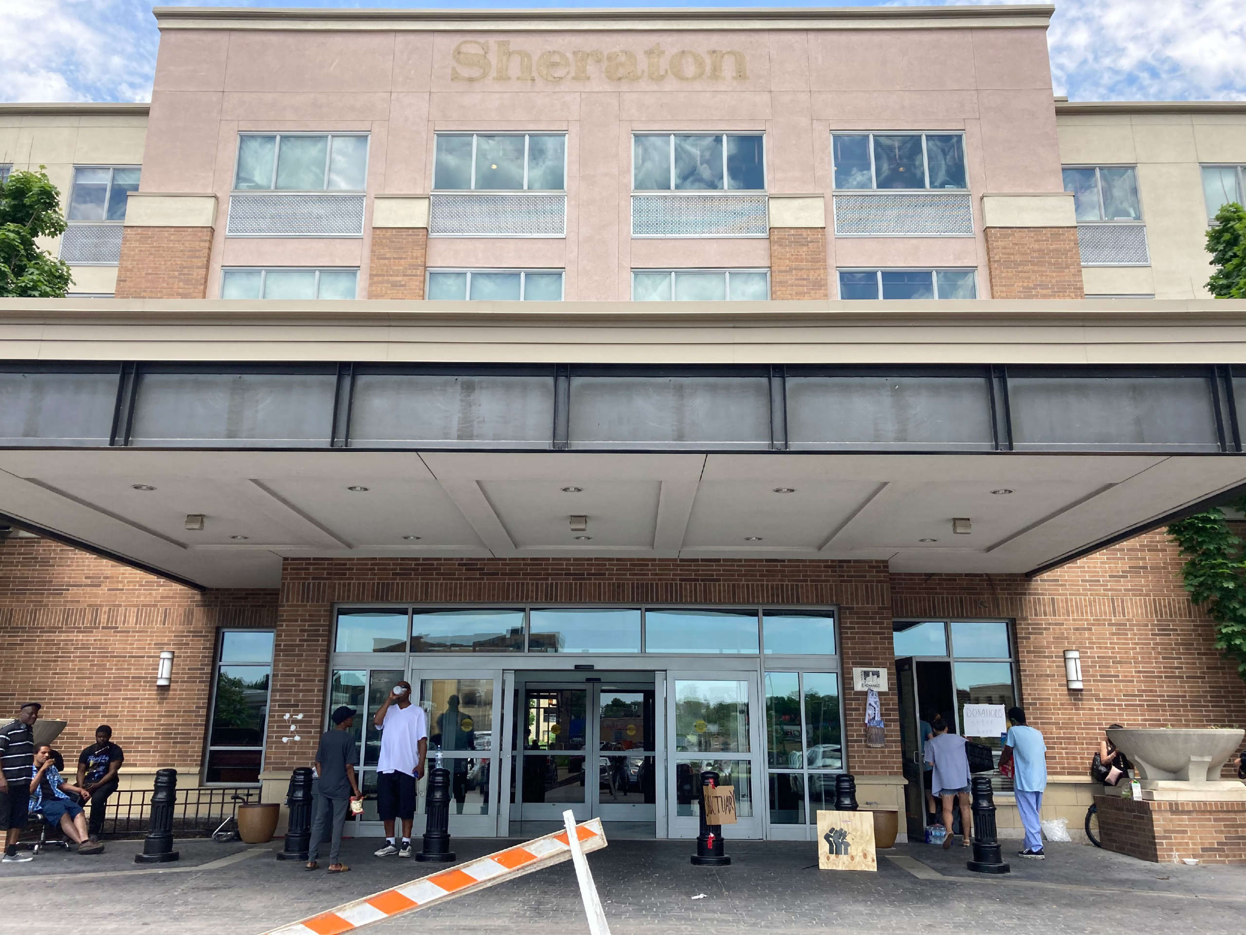 The Sheraton Midtown Hotel off the Lake Street corridor in south Minneapolis is now occupied by houseless residents and activists, who converted the building into a shelter for those displaced by conflict between protesters and the police.