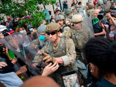 Members of the U.S. Army confront protesters near the White House on June 3, 2020, in Washington, D.C.