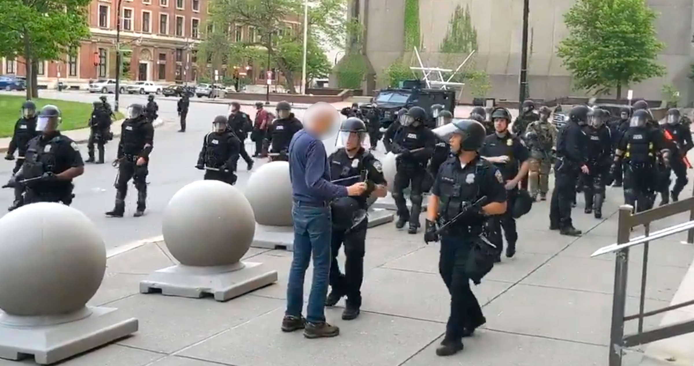 Buffalo Officers Suspended After Shoving 75 Year Old Demonstrator To