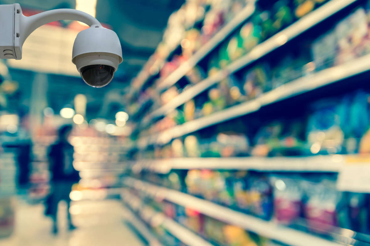 Security camera in grocery store aisle