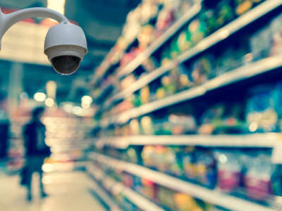 Security camera in grocery store aisle