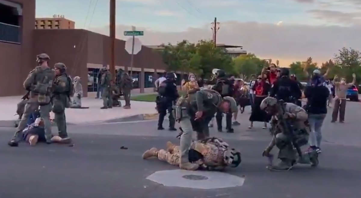 New Mexico Civil Guard members and one other man are arrested in this screegrab from video taken on June 15, 2020.