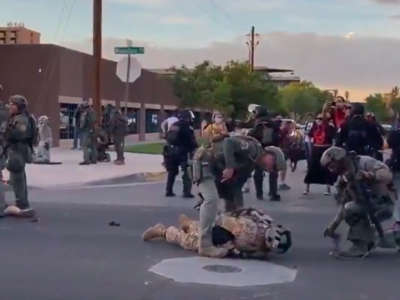 New Mexico Civil Guard members and one other man are arrested in this screegrab from video taken on June 15, 2020.