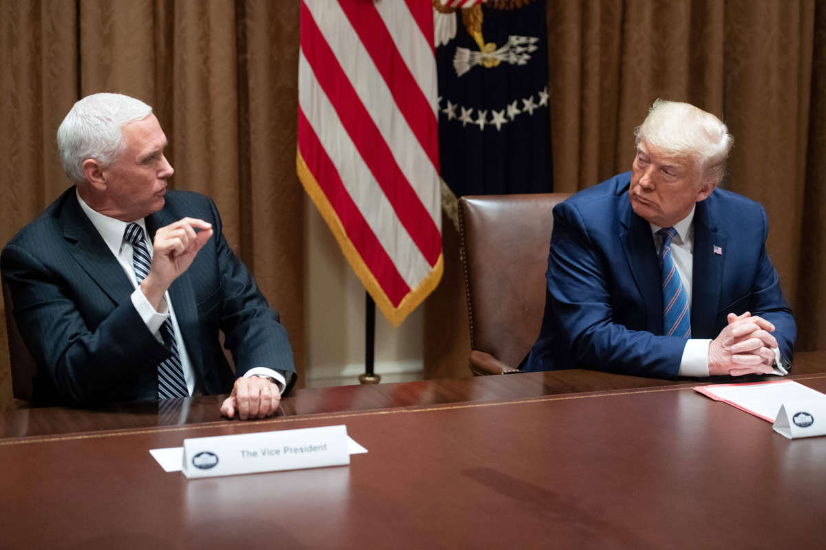 Vice President Mike Pence, with President Trump, speaks during a roundtable meeting on seniors in the Cabinet Room at the White House in Washington, D.C., June 15, 2020.