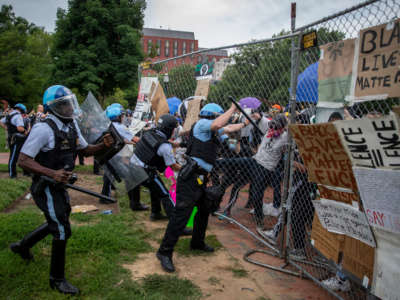 Protesters clash with U.S. Park Police after protesters attempted to pull down the statue of Andrew Jackson in Lafayette Square near the White House on June 22, 2020, in Washington, D.C.