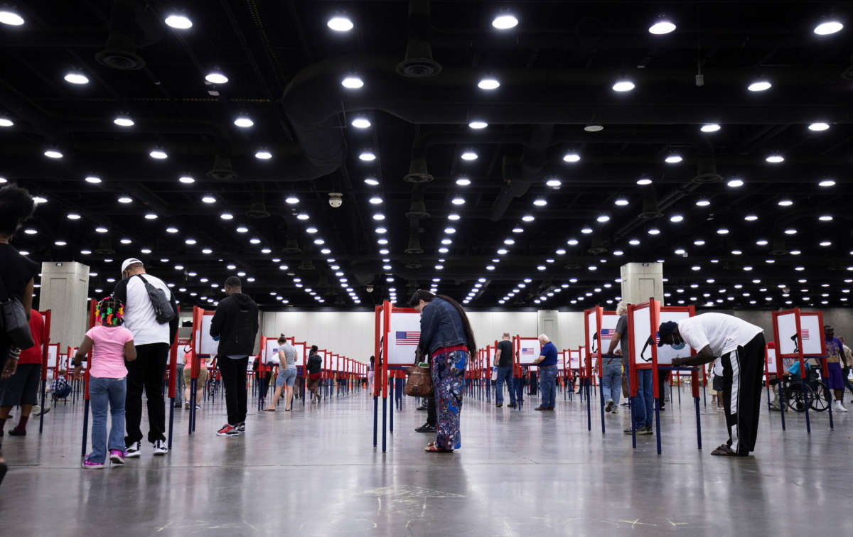 People vote during the Kentucky primary election on June 23, 2020, in Louisville, Kentucky. The Kentucky Exposition Center is the only polling location for the primary in Jefferson County, home to Louisville and 767,000 residents.