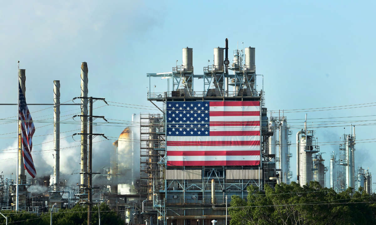 The US flag is displayed at the Wilmington Oil Fields south of Los Angeles, California, on April 21, 2020, a day after oil prices dropped to below zero.