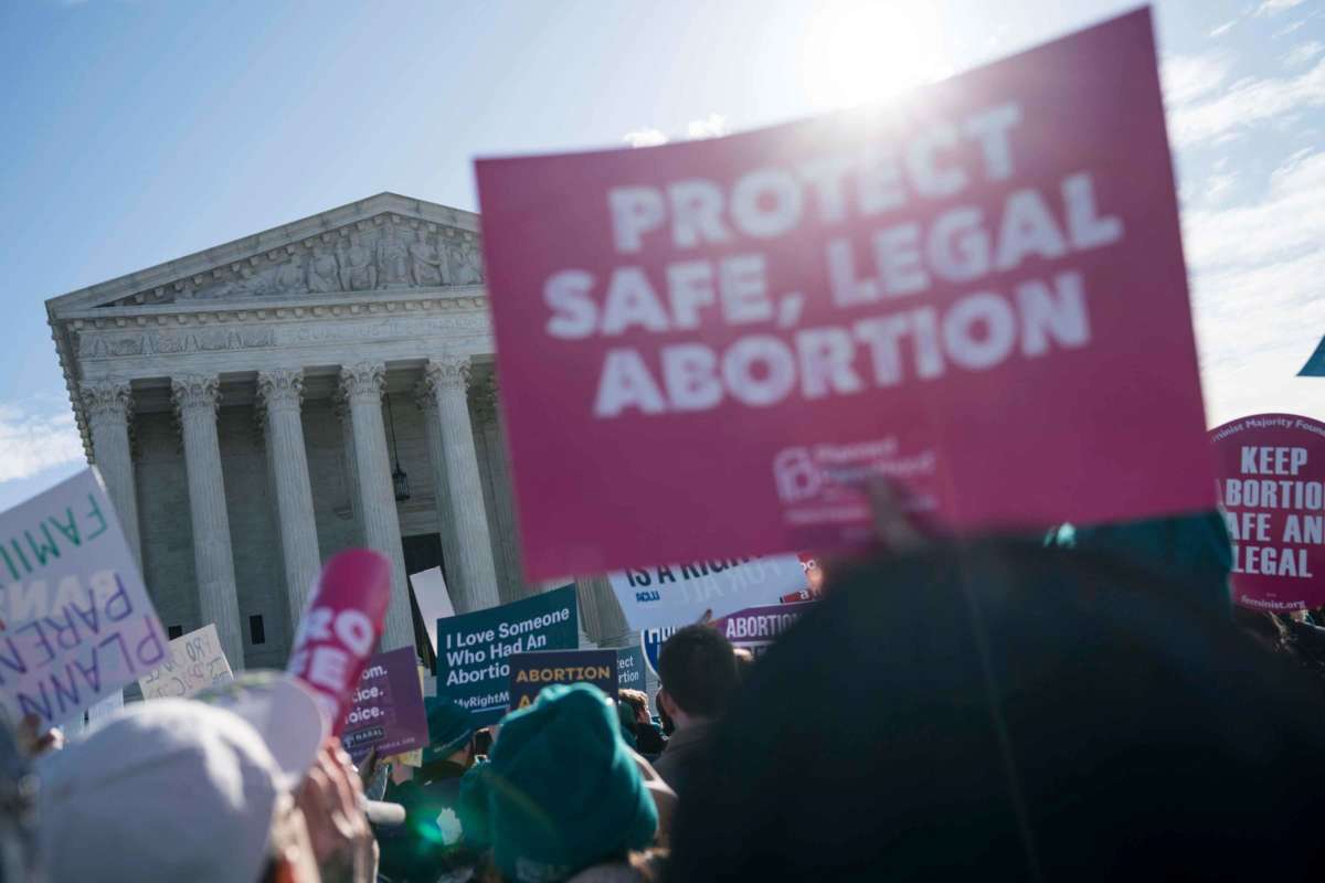 People participate in an abortion rights rally outside of the Supreme Court as the justices hear oral arguments in the June Medical Services v. Russo case on March 4, 2020, in Washington, D.C.