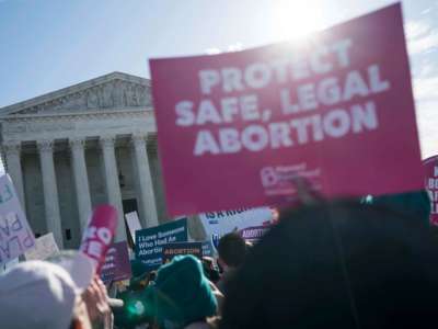 People participate in an abortion rights rally outside of the Supreme Court as the justices hear oral arguments in the June Medical Services v. Russo case on March 4, 2020, in Washington, D.C.