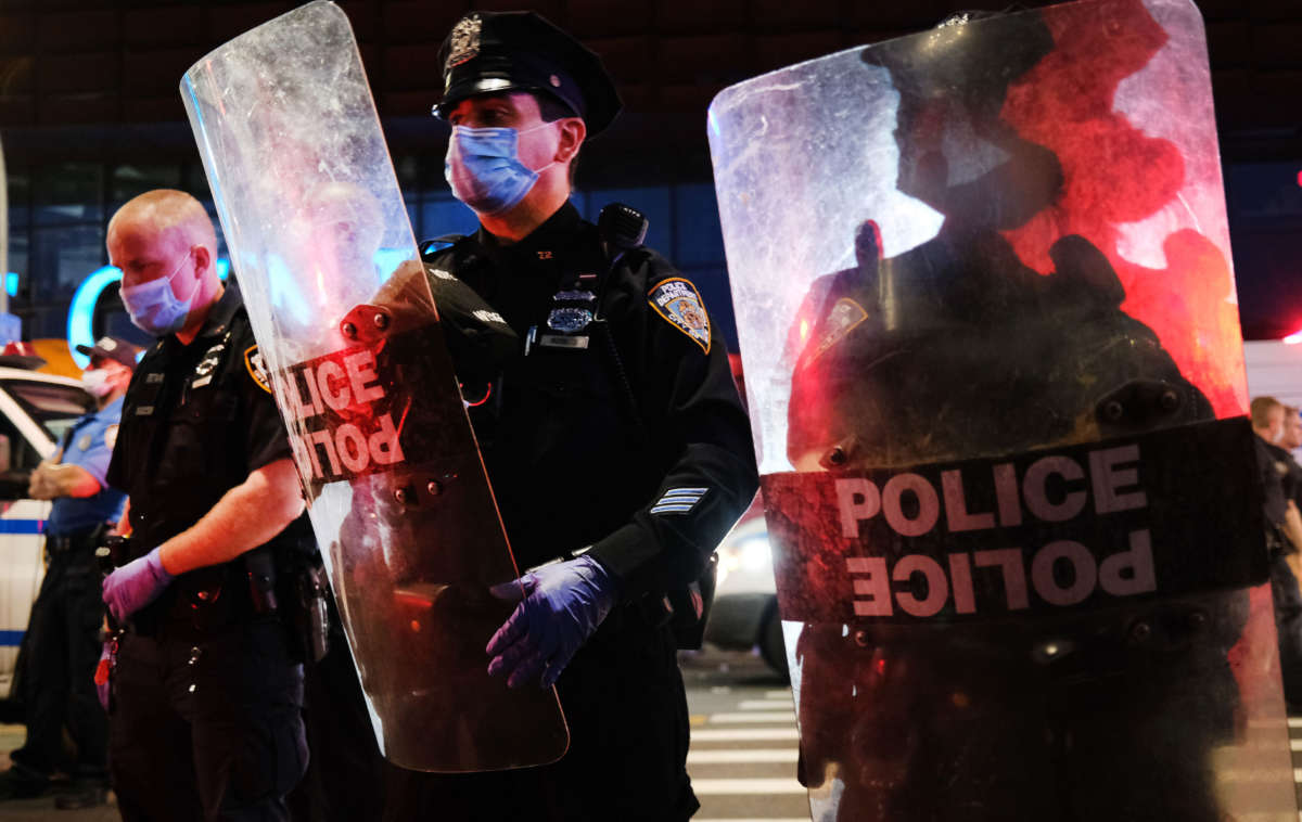 Police confront protesters in front of the Barclay's Center in Brooklyn on May 29, 2020, in New York City.