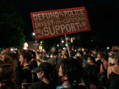 Demonstrators denouncing systemic racism and the police killings of black Americans take to the streets in the borough of Brooklyn on June 6, 2020, in New York City.