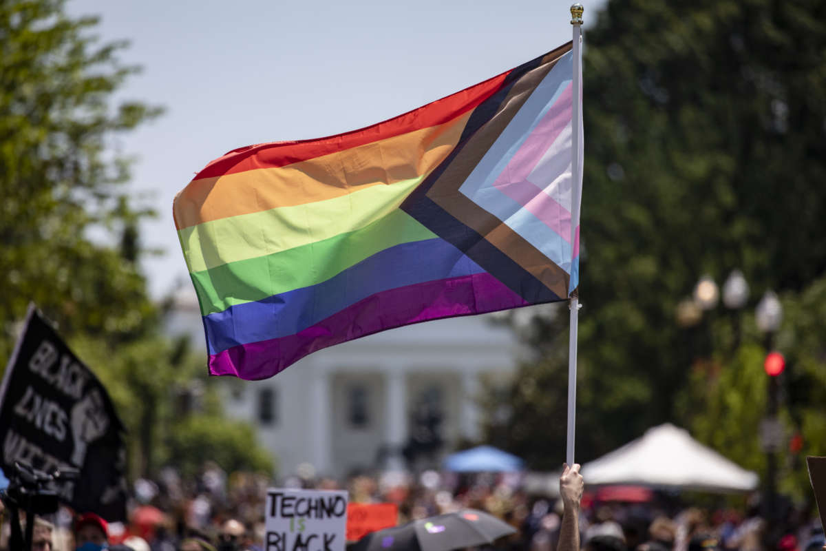 Members and allies of the LGBTQ community reach Black Lives Matter Plaza across the street from the White House as part of the Pride and Black Lives Matter movements on June 13, 2020, in Washington, D.C.