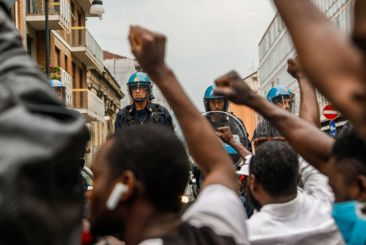 Hundreds of demonstrators march in Turin, Italy, to support Black Lives Matter during a protest against police brutality and racial inequality in the US and other parts of the world after police killed George Floyd, which sparked protests worldwide.