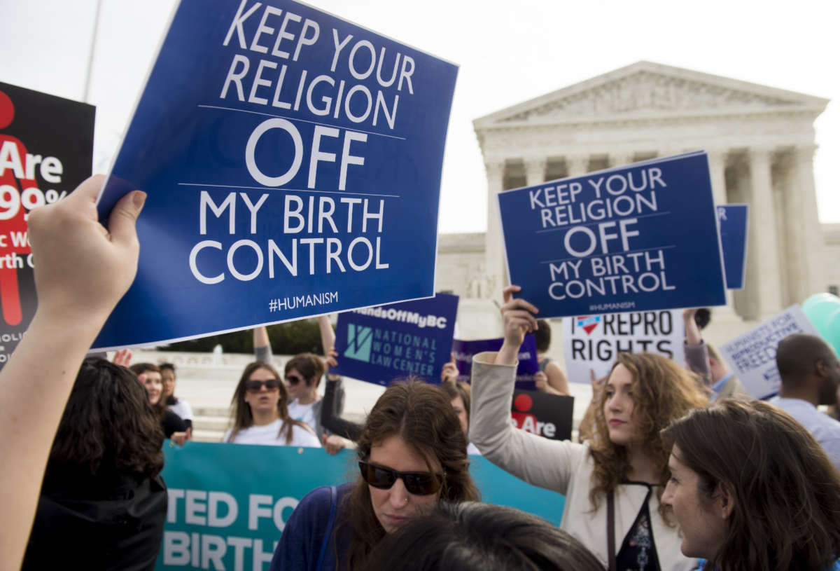 Protesters rally outside the Supreme Court in Washington, D.C., March 23, 2016.