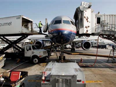 Gate Gourmet delivers food containers to United Airline, at LAX, December 14, 2005.