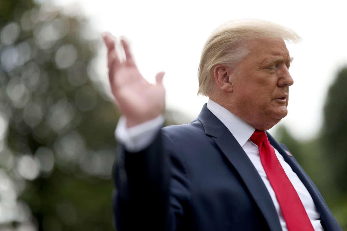 President Trump waves while departing the White House on Marine One on July 10, 2020, in Washington, D.C.