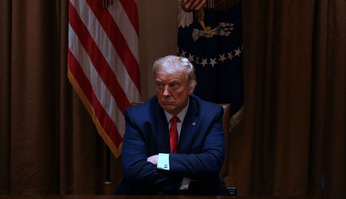 President Trump sits in the cabinet room at the White House on July 9, 2020, in Washington, D.C.