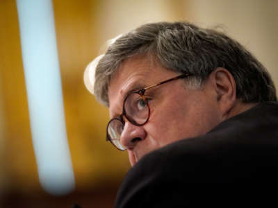 Attorney General William Barr listens during an event about citizens positively impacted by law enforcement, in the East Room of the White House on July 13, 2020, in Washington, D.C.