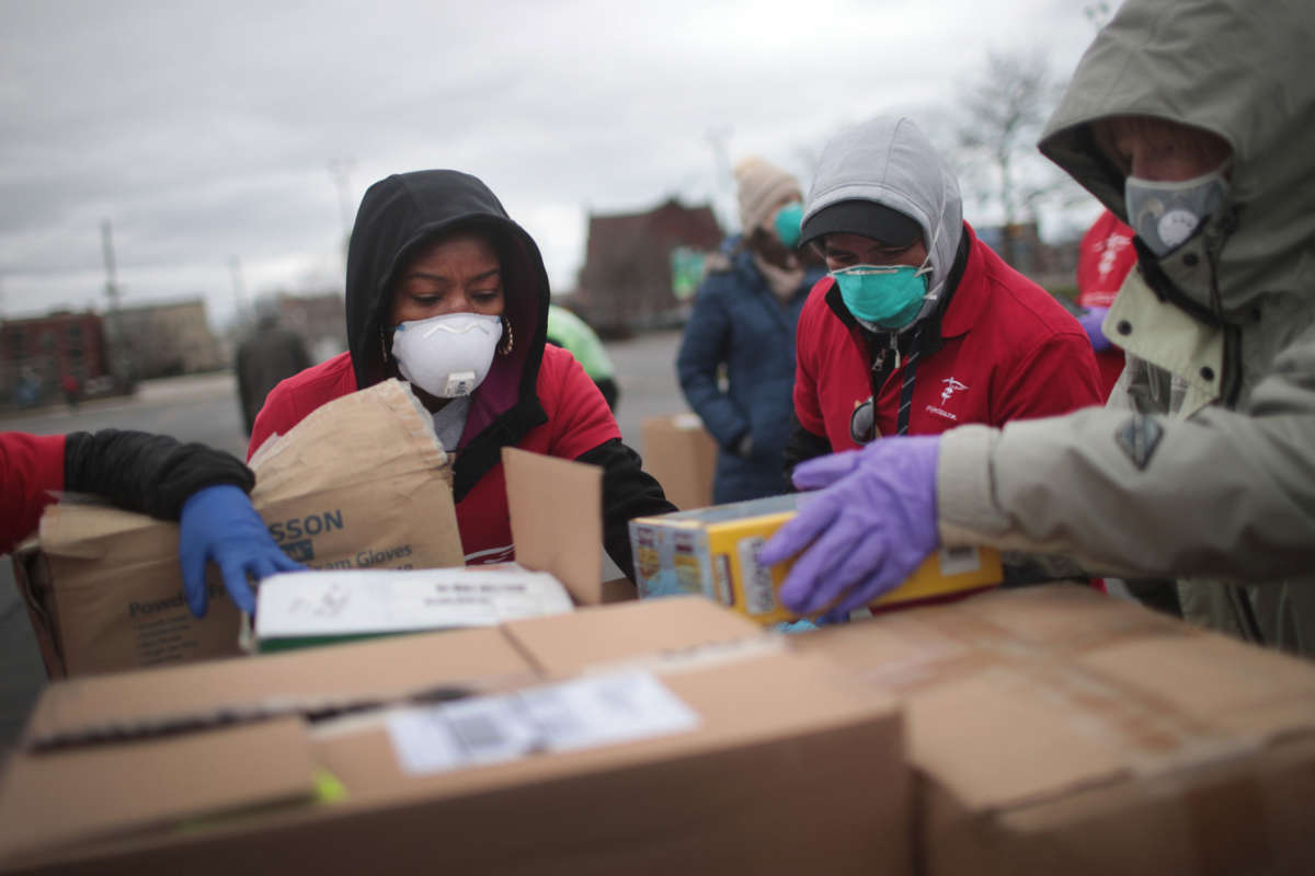 Staff and volunteers hold a drive to collect donations of Personal Protective Equipment from the community to supply hospitals and clinics that are experiencing shortages due to the COVID-19 pandemic on March 29, 2020, in Chicago, Illinois.