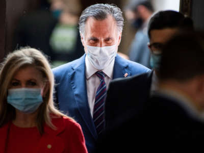 Sen. Mitt Romney leaves the Senate Republican Policy luncheon in the Hart Building on June 23, 2020.