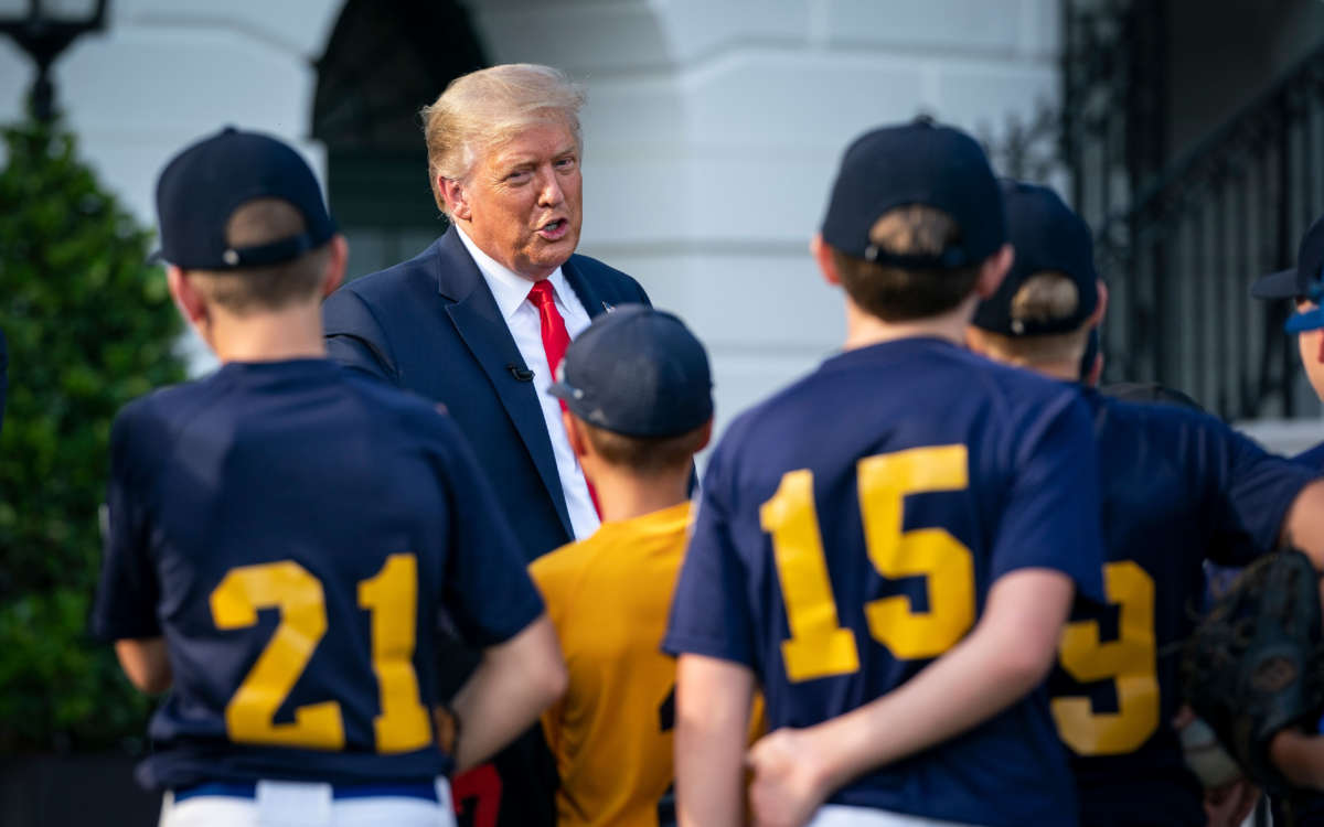 President Trump talks with youth baseball players on the South Lawn of the White House on July 23, 2020, in Washington, D.C.