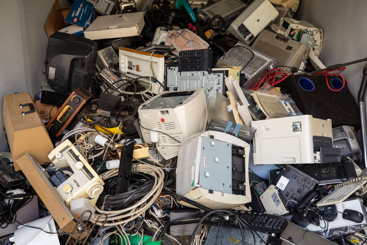 Electronic scrap piled at a recycling yard.